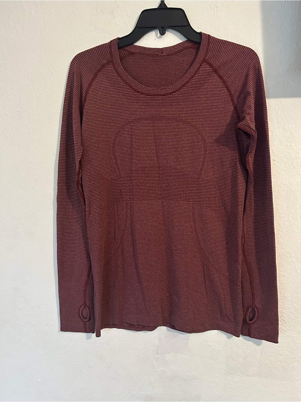 Lululemon swiftly tech long sleeve 2.0 size 10
Heathered rust berry
